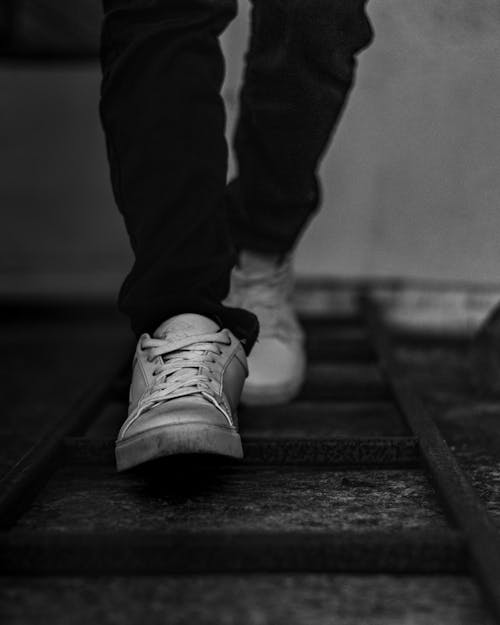 Photo of Person Wearing Sneakers · Free Stock Photo