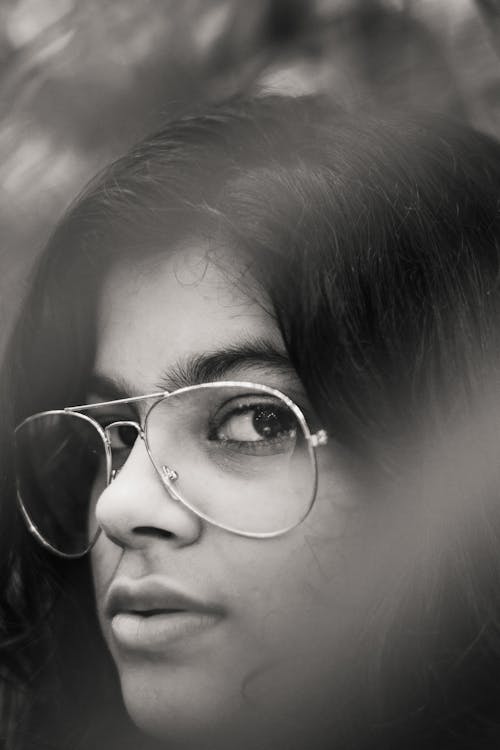 Side View Photography of a Woman in Eyeglasses 