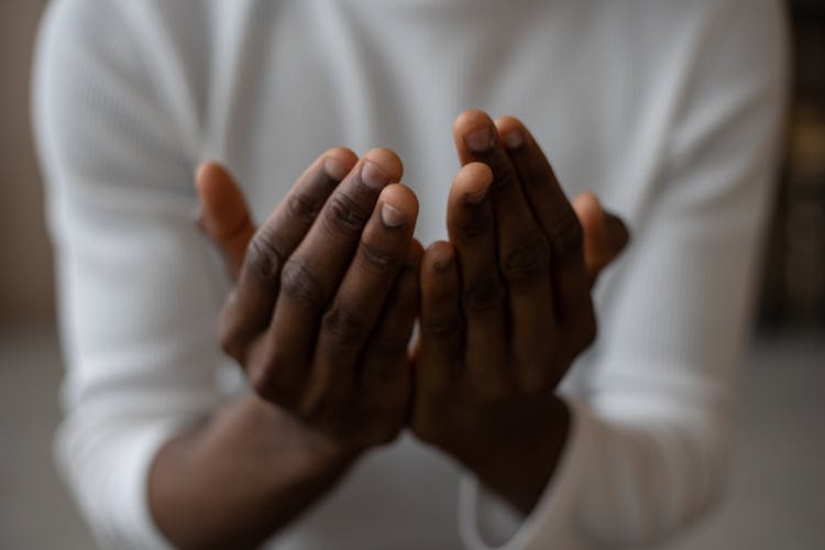 Crop Black Man Praying At Home