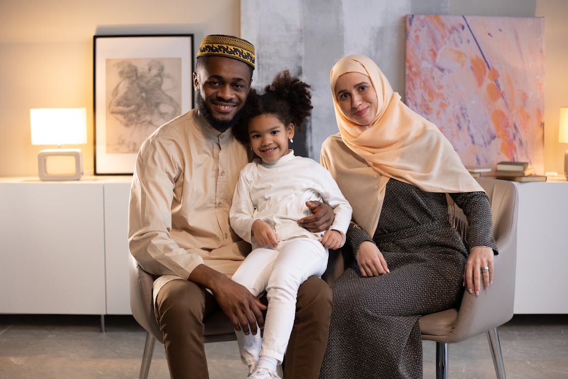 Free Happy black family in light room Stock Photo