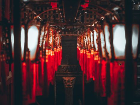 A mesmerizing view of glowing red lanterns inside the historic Man Mo Temple.