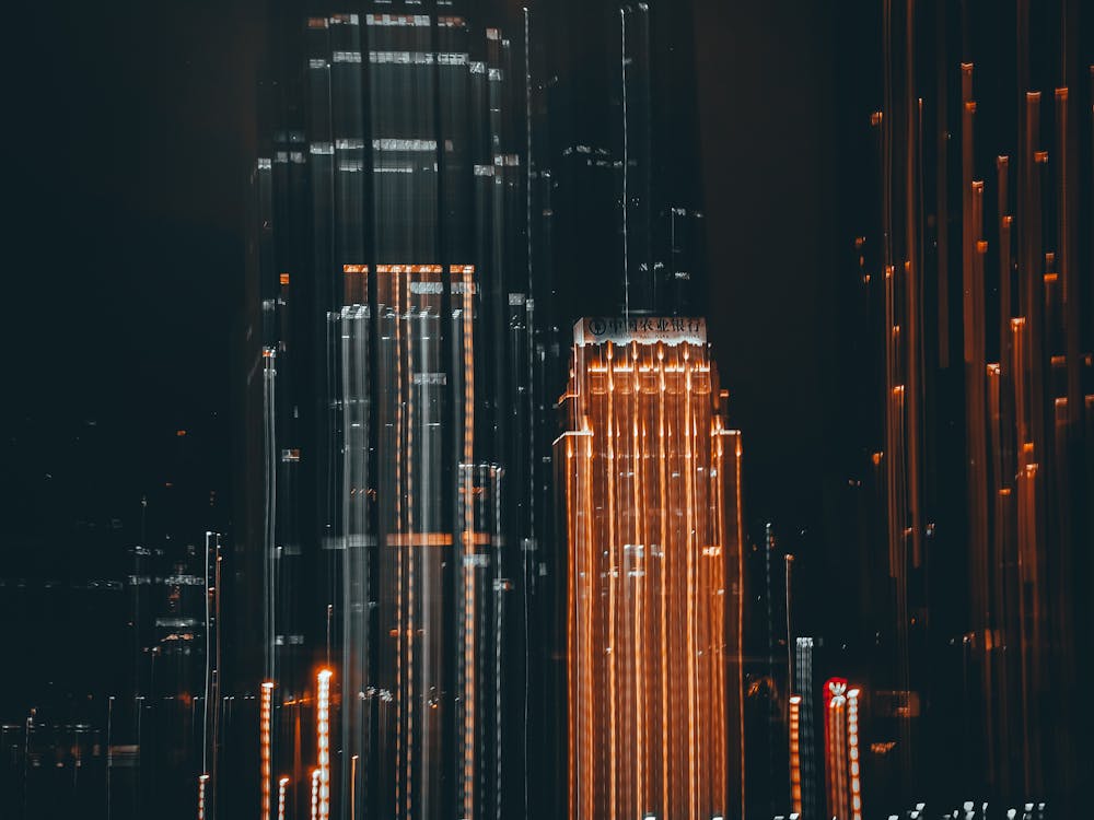 High Rise Building in the City during Night Time · Free Stock Photo