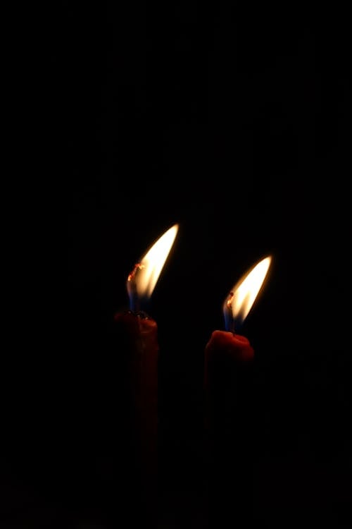 Lighted Candles in Dark