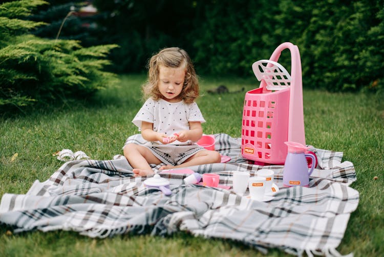 A Young Girl Playing Toys 