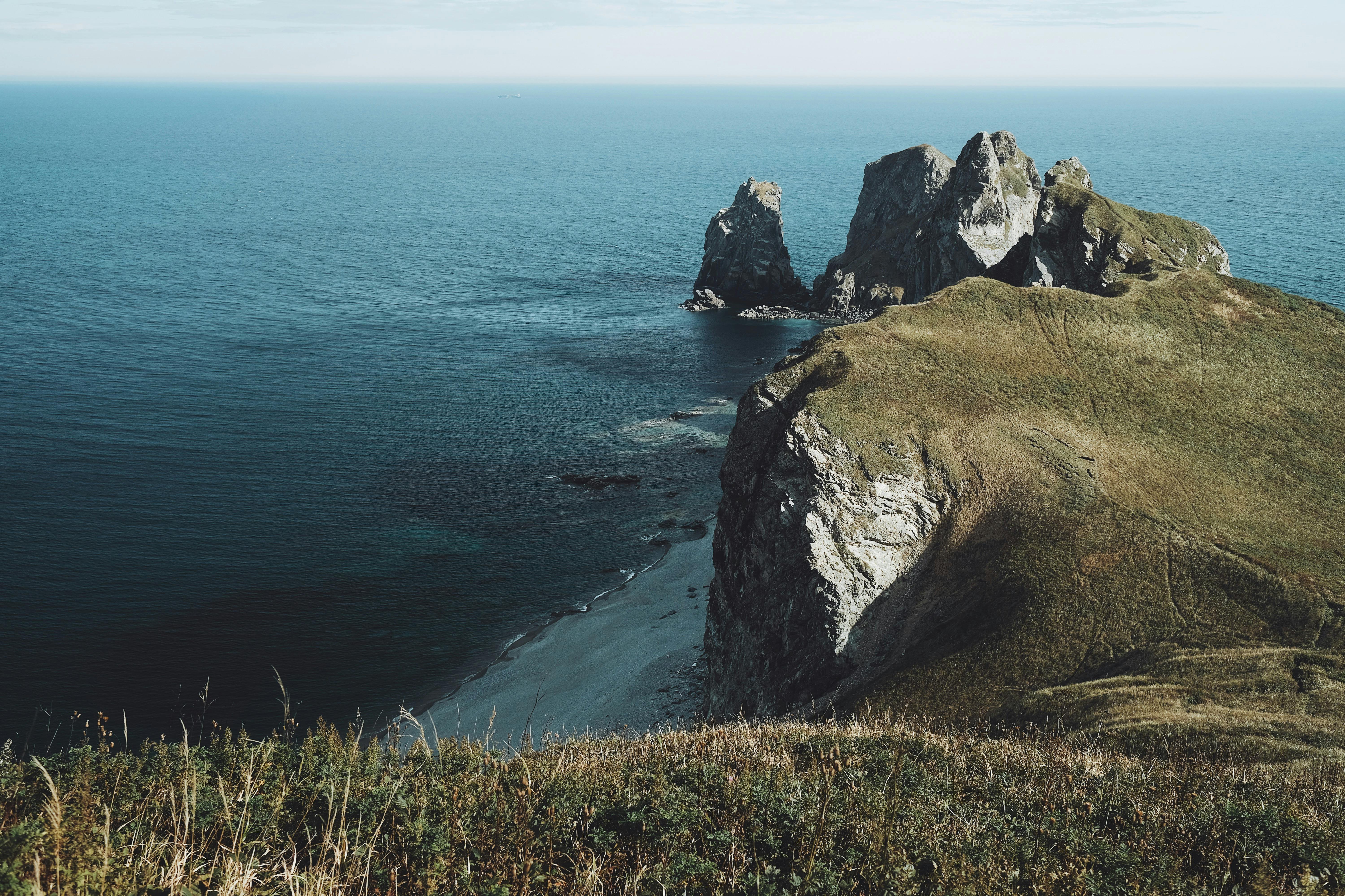 Explore rugged cliffs and vast ocean views in this stunning landscape photography.