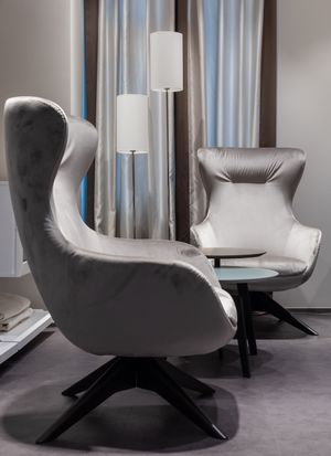 Lomvik gray upholstered armchair — photo by Max Vakhtbovych on Pexels