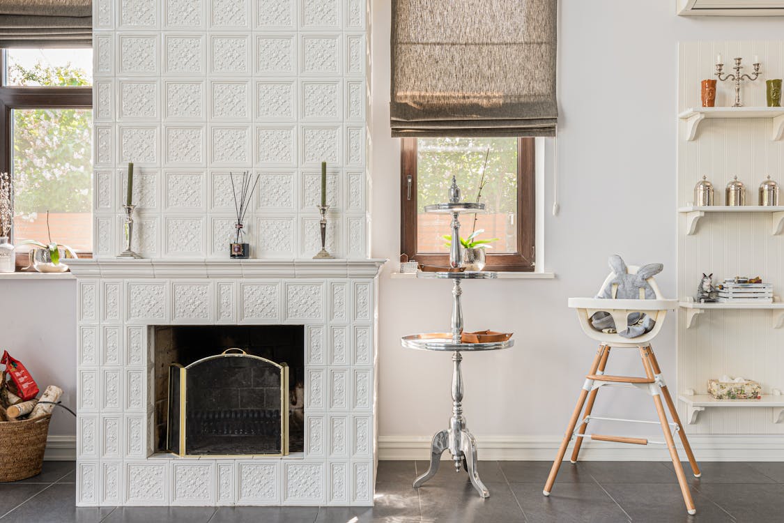 a white stone fireplace