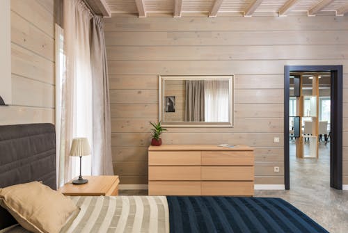 Cama En Dormitorio Moderno Con Muebles