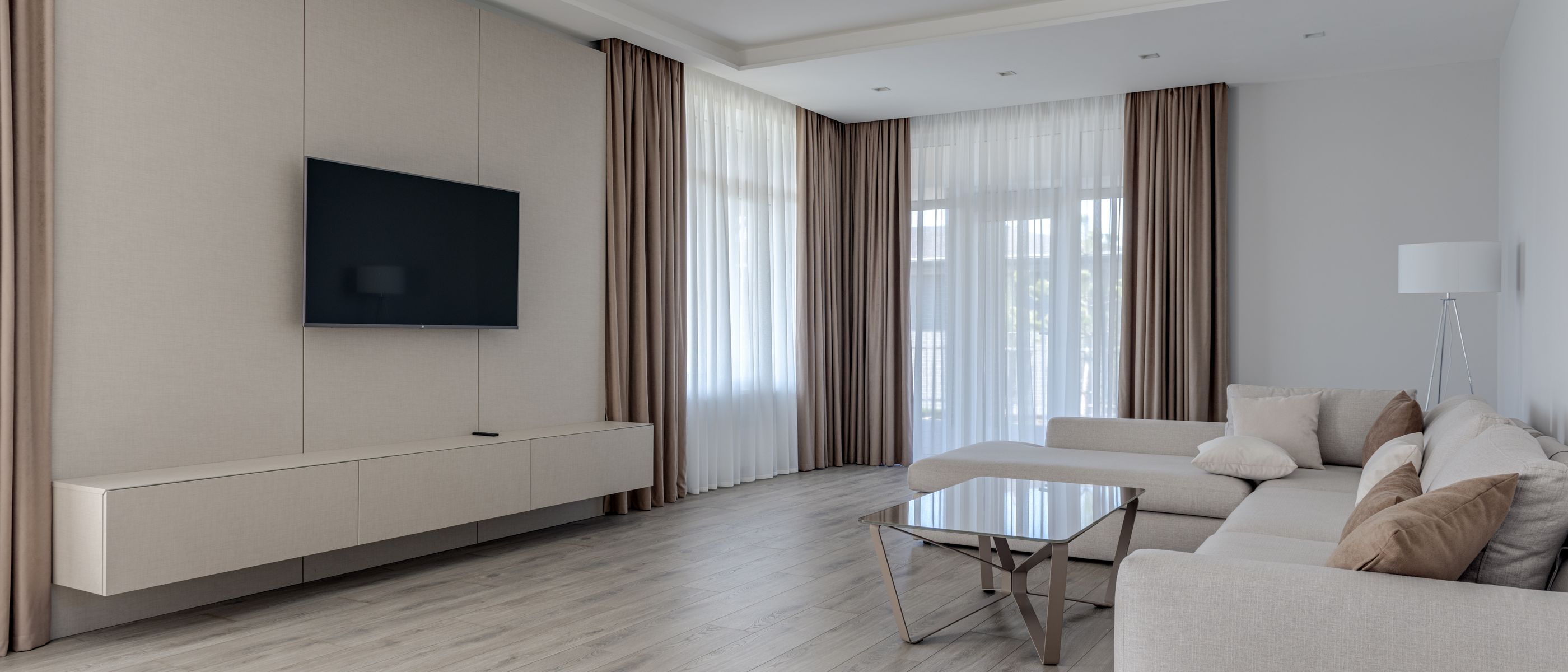 Wallpapering in Petersham — woodwork brushed to a crisp, smooth line