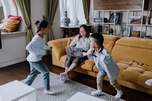 Free A Family in the Living Room Together Stock Photo
