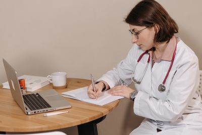 Doctor taking notes