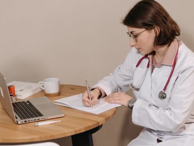 Doctor taking notes