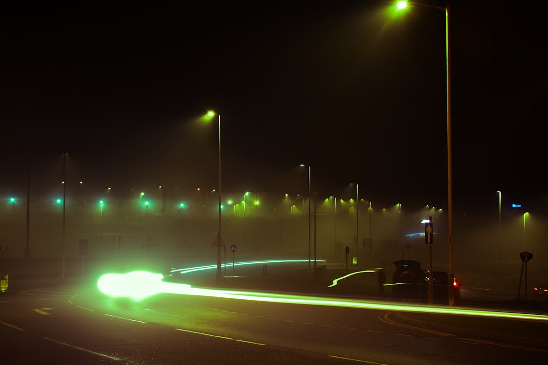 Free Time-Lapse Photography of Cars on Road during Night Time Stock Photo