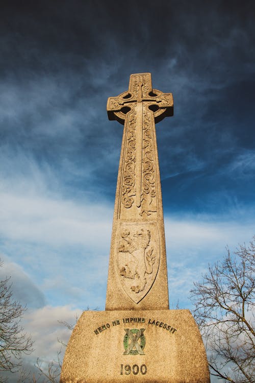 Brown Cross Under the Blue Sky