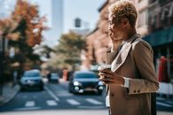 Happy black businesswoman having phone call