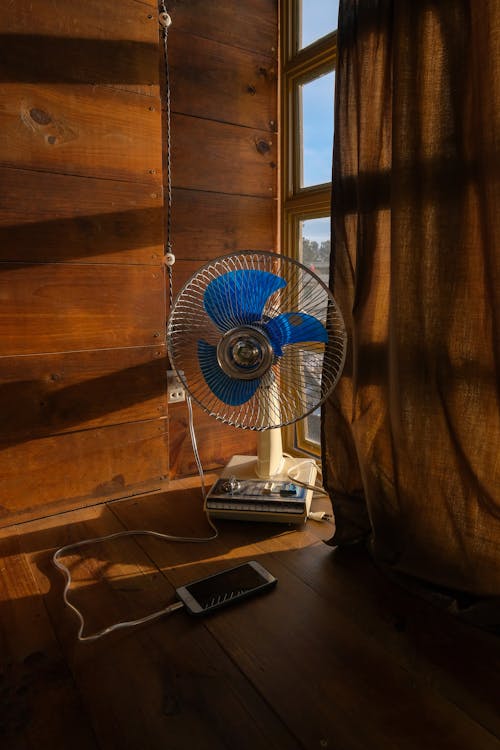 Electric Fan by the Window