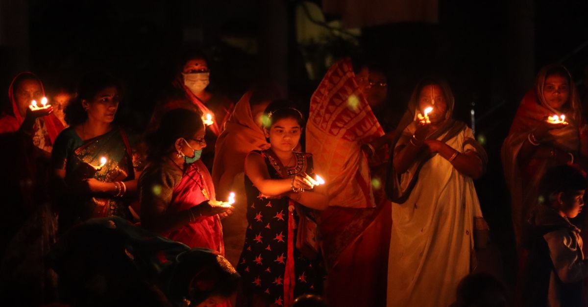 Women with Lighters During a Ritual · Free Stock Photo