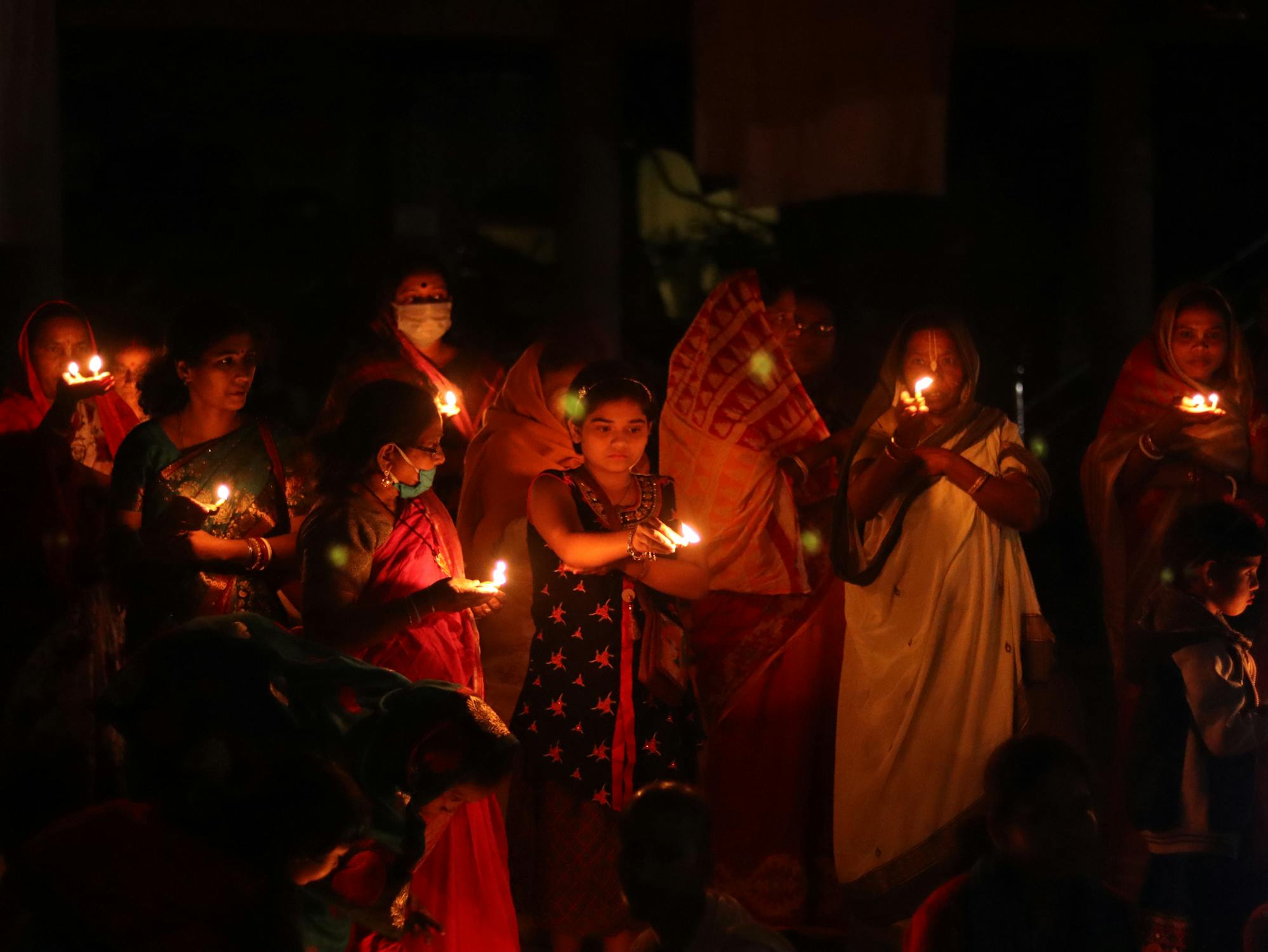 Women with Lighters During a Ritual · Free Stock Photo