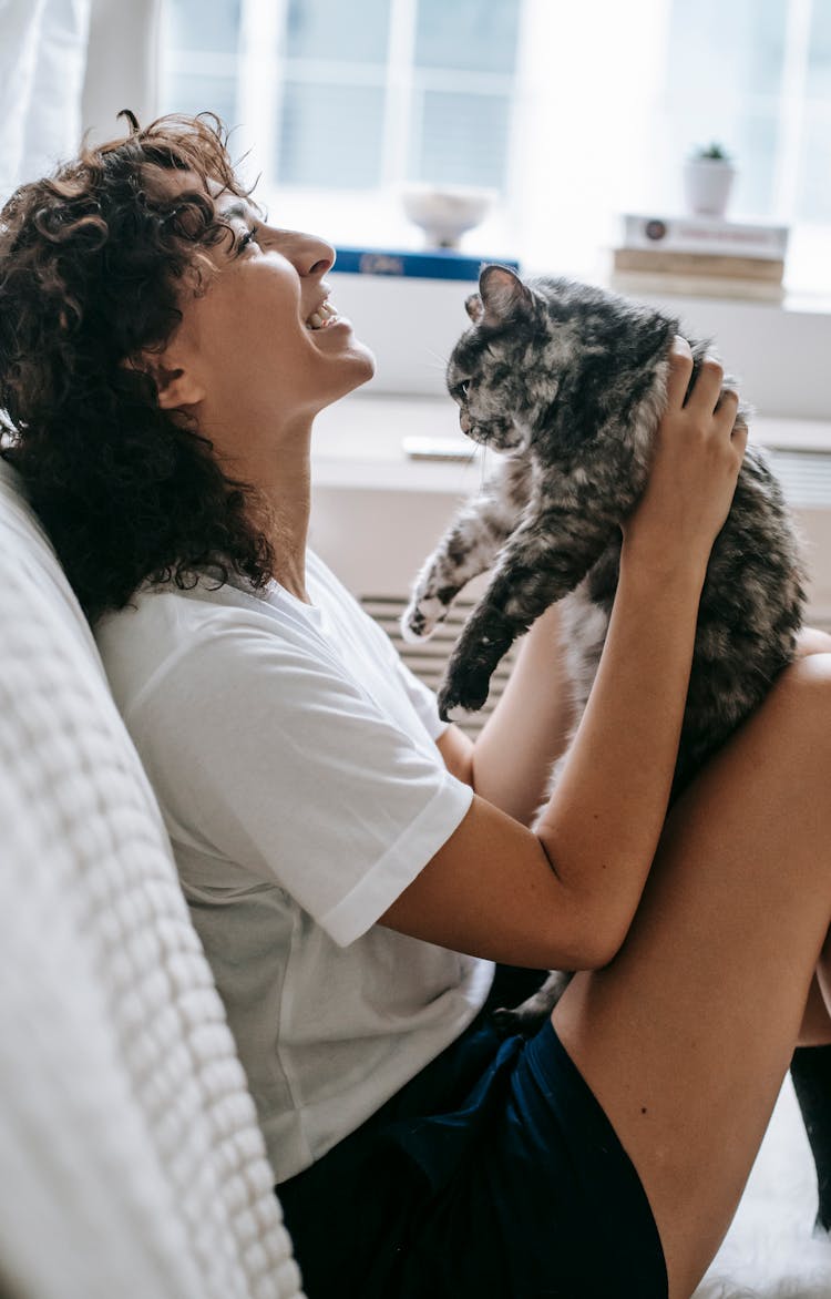 Laughing Woman With Cute Fluffy Cat