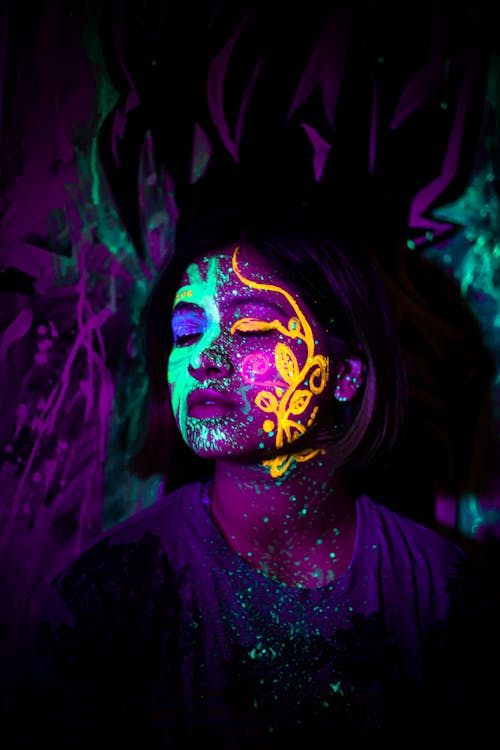A Woman With Neon Face Paint