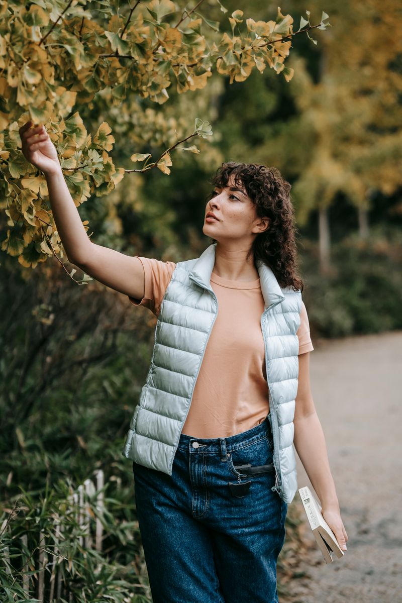Woman in a quilted vest over a thermal top