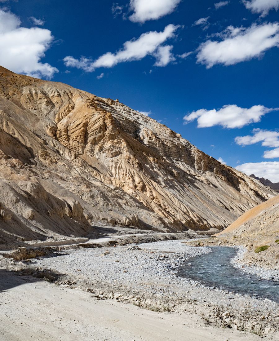 A river valley between rugged mountain ranges
