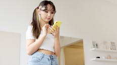 Woman Holding a Cellphone