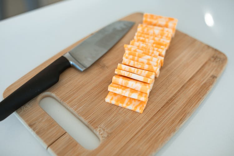 Colby-Jack Cheese On Brown Wooden Chopping Board