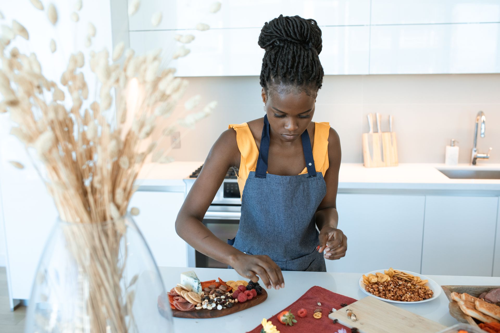 A Woman Standing at the Kitchen Counter