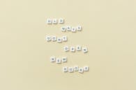 A Phrase Spelled with Scrabble Tiles