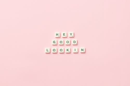 Plastic Blocks Script on Pastel Pink Background