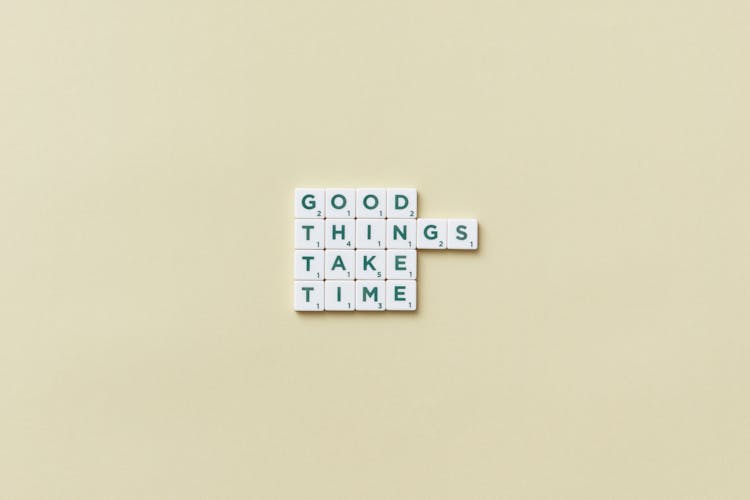 Scrabble Script On Pale Green Background