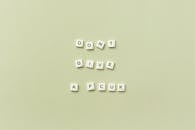 Words Arranged on Plain Background