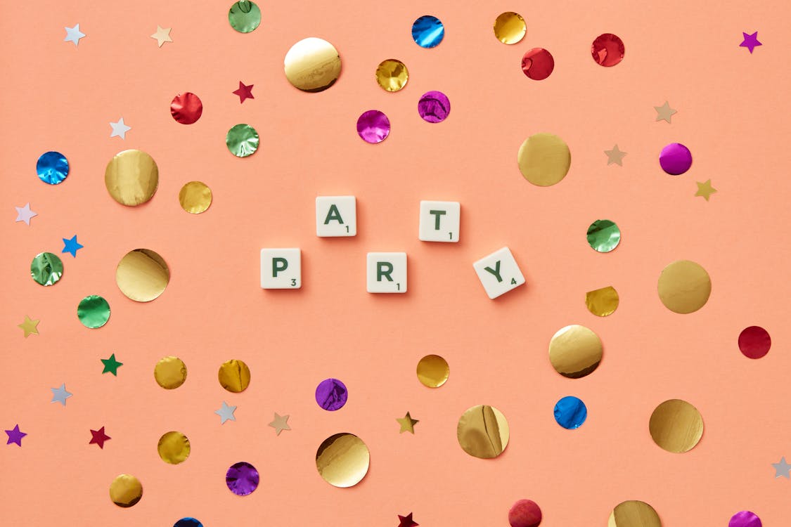Free Word Party Made of Scrabble Tiles Stock Photo