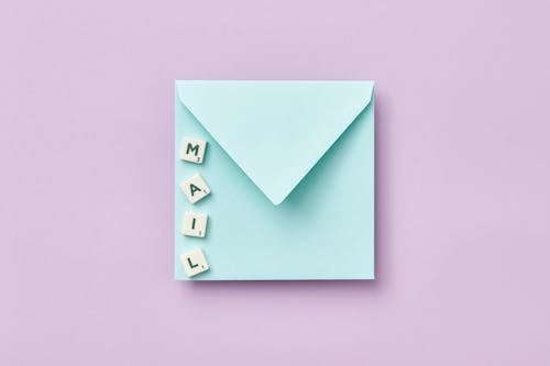 Scrabble Tiles on an Envelope