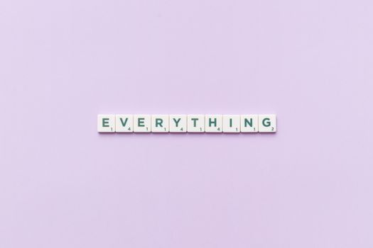 Minimal Image of a Scrabble Word on Lilac Background