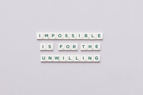 Inspirational Message Arranged with Scrabble Letter Tiles