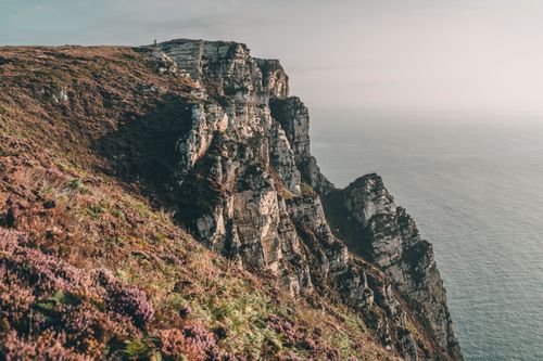Free Breathtaking view of the rugged cliffs in Donegal, Ireland, captured in stunning natural light. Stock Photo
