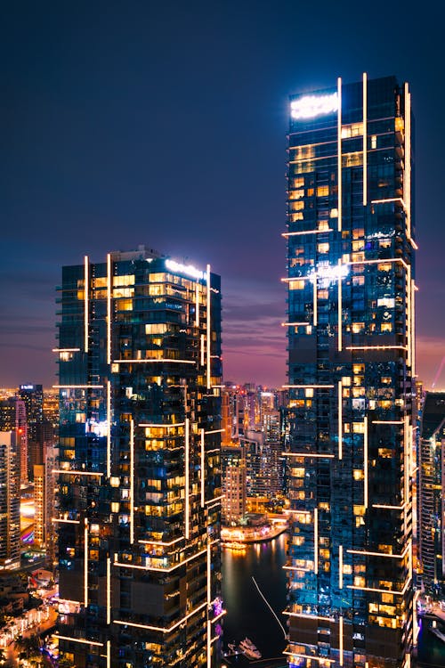 Waterfront Buildings at Night Time