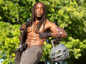 Topless Woman in Brown Pants Riding Bicycle