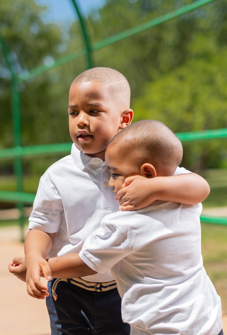 Photo Of Boys Hugging