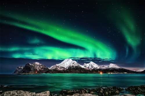 A Snow Covered Mountain Under the Beautiful Sky