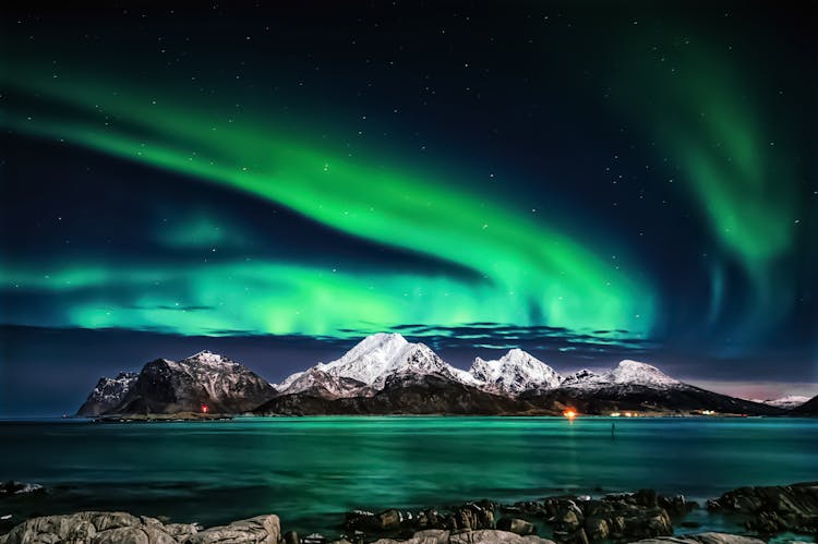 A Snow Covered Mountain Under The Beautiful Sky