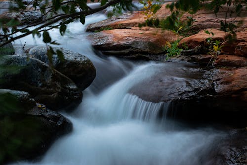 Безкоштовне стокове фото на тему «вода, Водоспад, камені»