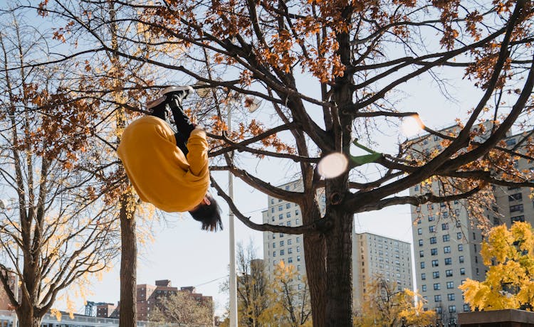 Faceless Male Athlete Doing Parkour In Park