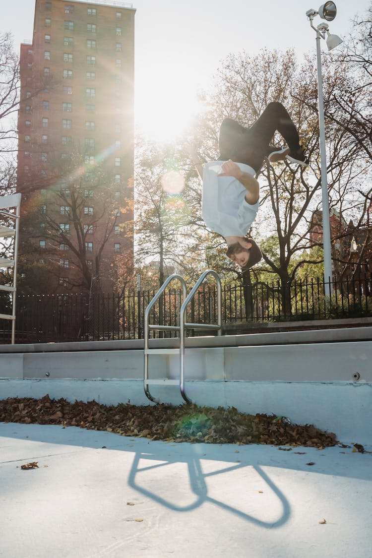 Man Doing Extreme Trick In Park