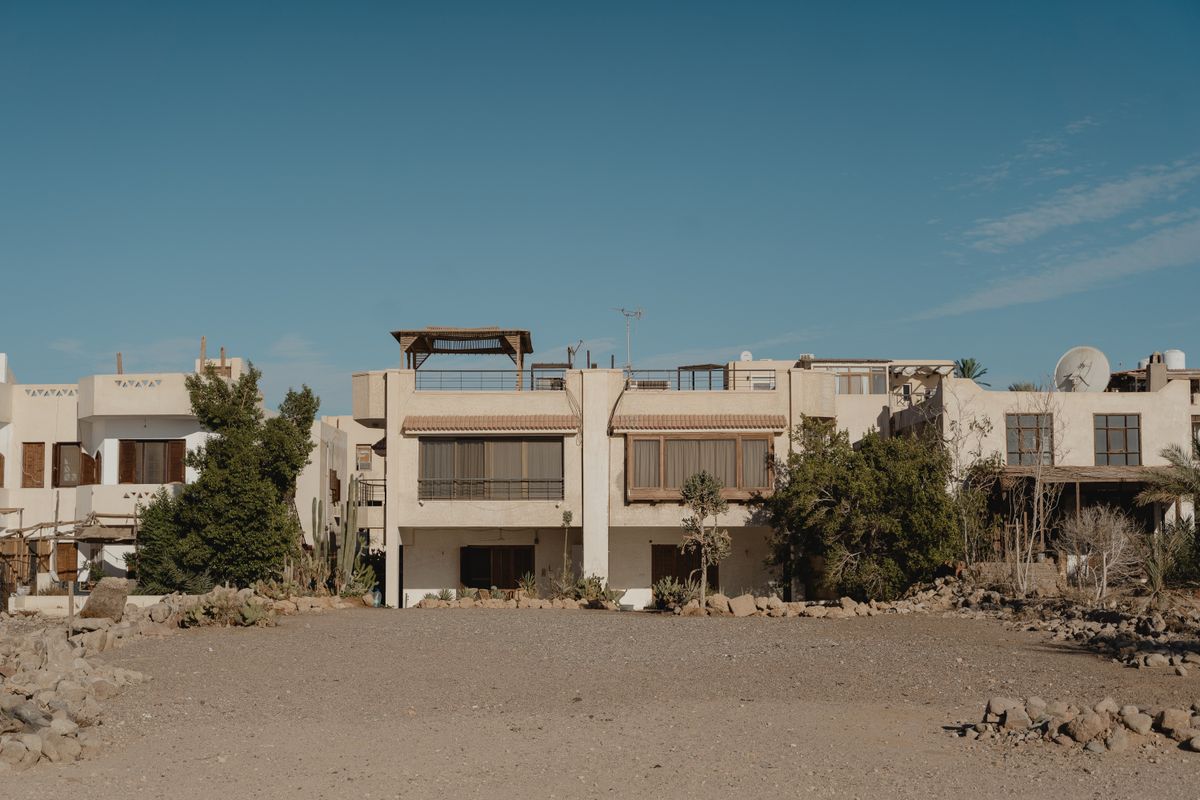 Desert residential neighborhood under a clear blue sky