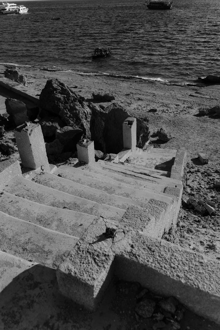 Broken Stairs On A Beach