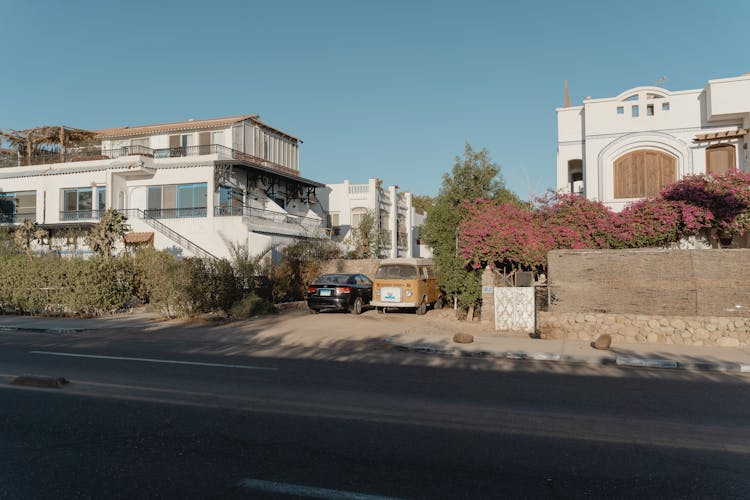 Parked Cars Outside Buildings