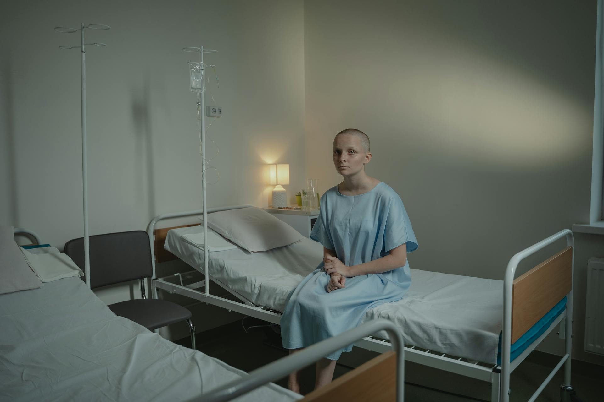 A Patient Sitting on the Hospital Bed